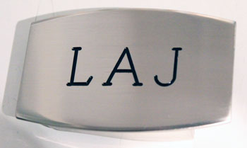 Devanet coour filled intials etched into buckle